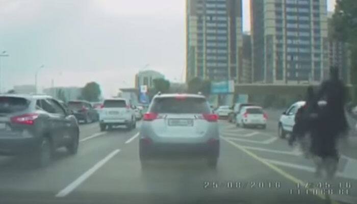 OMG! Man rides ostrich to beat traffic in Kazakhstan - Must Watch