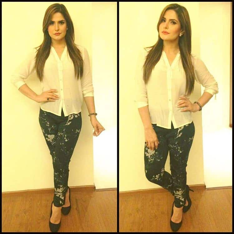 zareen khan :- Wearing a white crape shirt with appliquéd cigarette pants embellished with swarovski crystals from Designer Nikita Mhaisalkar @nikita_mhaisalkar for the APPLE store launch in Rudrapur