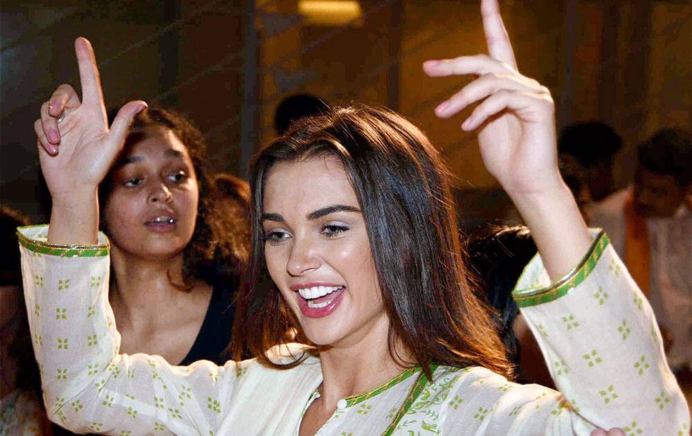 Amy Jackson dancing in the immersion procession during Ganesh chaturthi celebrations