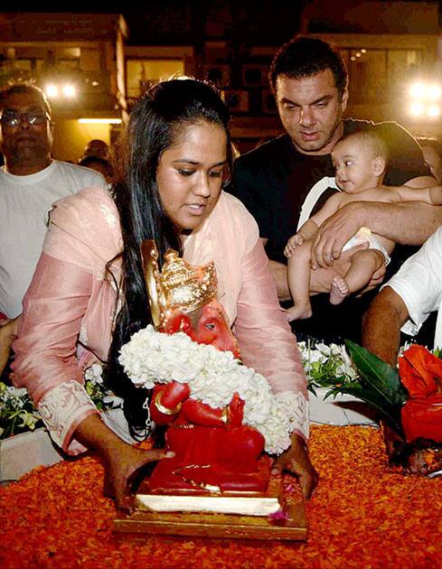 Sohail Khan with sister Arpita Khan Sharma and her son participate in an immerson procession during Ganesh Utsav celebrations in Mumbai