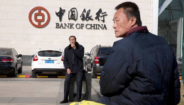 Thousands lose jobs as China&#039;s state-owned banks cut costs