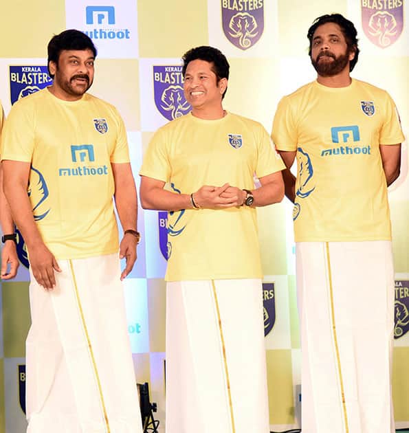 Sachin Tendulkar with co- owners of the team Chiranjeevi, Nagarjuna at the unveiling of the Kerala Blasters jersey in Kochi