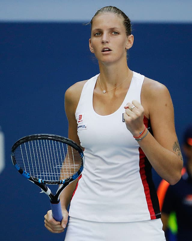 Karolina Pliskova clenches her fist after a point against Ana Konjuh during the quarterfinals of the U.S. Open tennis tournament.