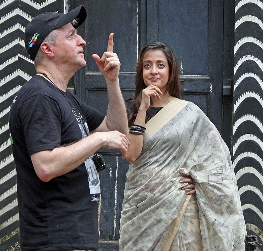director Pablo Cesar gives instruction to actress Raima Sen during the shooting of his film ‘Thinking of Him’ based on Rabindranath Tagore