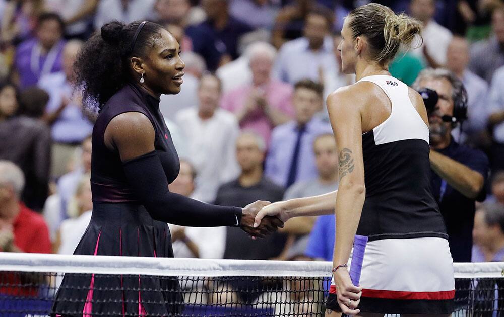 Karolina Pliskova, of the Czech Republic, greets Serena Williams after winning their semifinal match of the US Open tennis tournament in New York