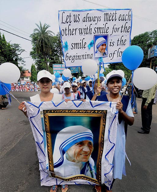 Students take part in a rally celebrating Mother Teresas Canonization in Guwahati