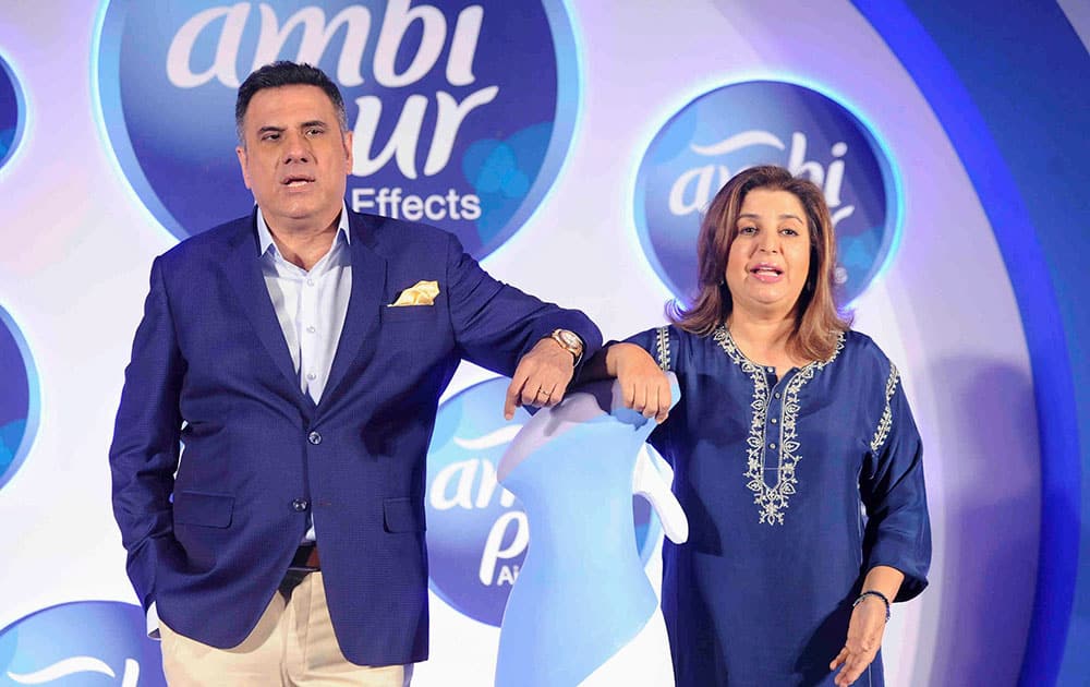 Boman Irani with Producer-director Farah Khan during a product launch in Mumbai