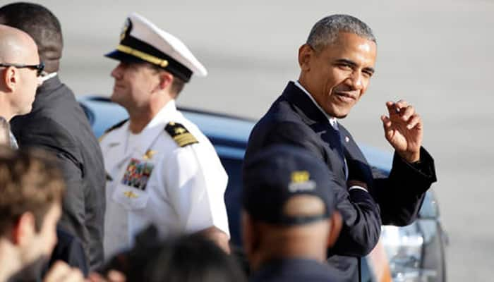 Barack Obama to consider easing Myanmar sanctions as Aung San Suu Kyi visits