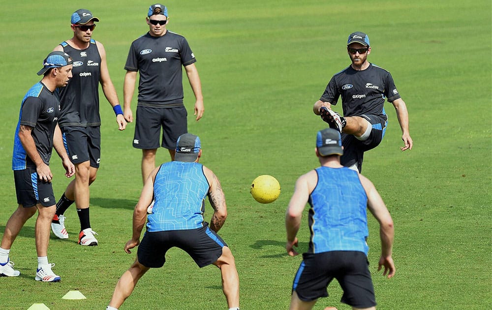 New Zealand team plays football during the team practice at the Ferozeshsh Kotla Stadium in New Delhi