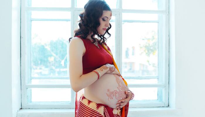 Flaunt your baby bump in style this wedding season