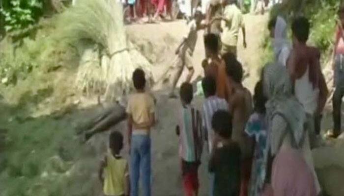 Bihar Police brutality caught on camera, cops drag dead body with rope around neck - WATCH