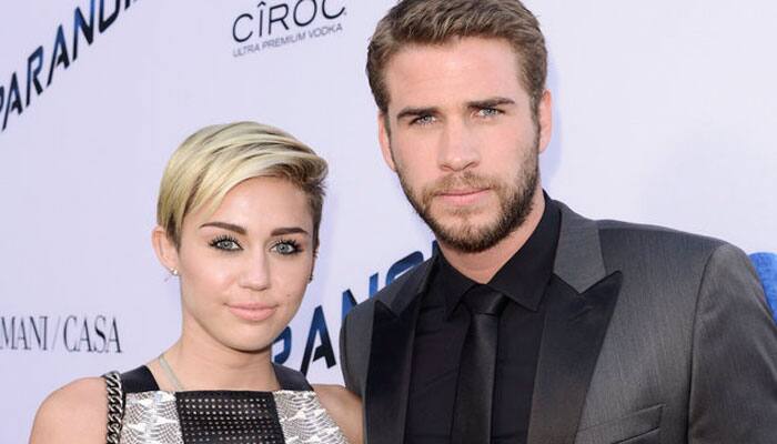 Miley Cyrus, Liam Hemsworth writing romantic play