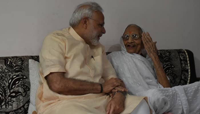 PM Narendra Modi celebrates his 66th birthday with mother in Gujarat - See Pics