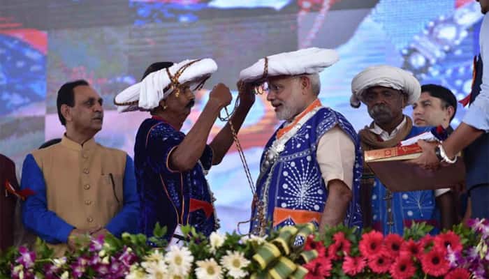 PM Modi celebrates birthday with mother, tribals, specially-challenged