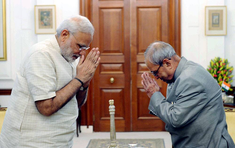 Prime Minister Narendra Modi greets President Pranab Mukherjee