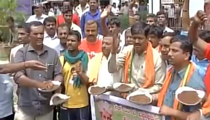  Cauvery water sharing row: Pro-Kannada groups protest in Mandya by eating mud, restrictions imposed