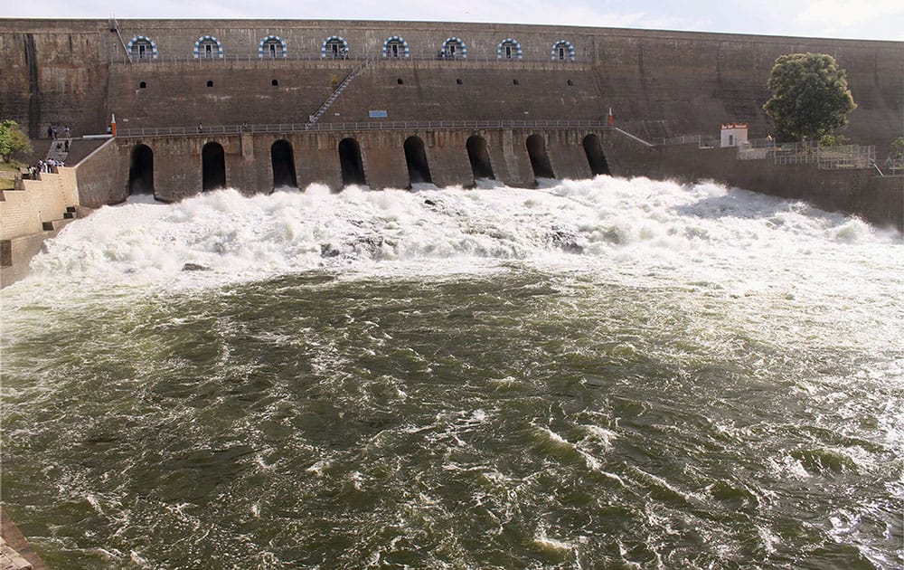 Water gushes out after the release of water from Mettur Dam in Salem in Tamil Nadu for irrigation of over 12 lakh acres of Samba crops