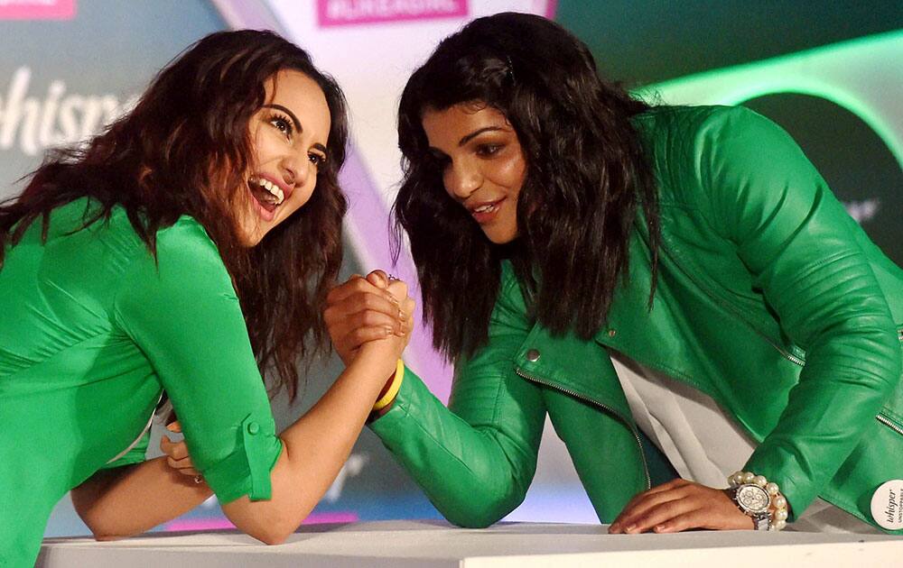 Wrestler Sakshi Malik and bollywood actress Sonakshi Sinha during a promotional event