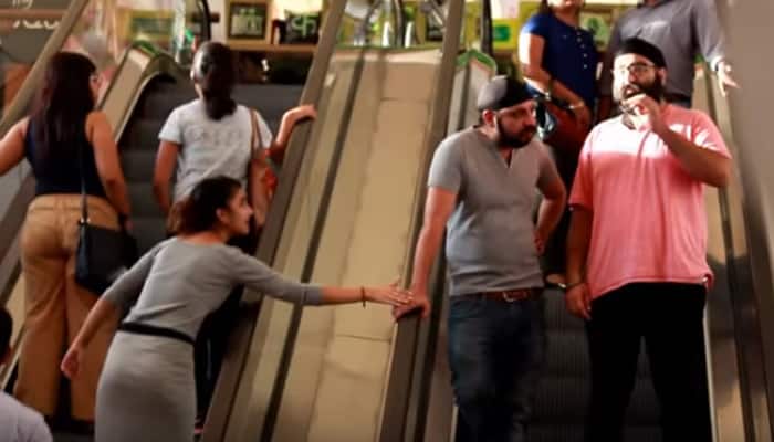How will you react if a stranger touches your hand in a mall? Check out others&#039; responses and they are hilarious - WATCH
