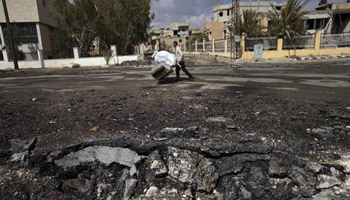 Raids set rebel areas of Syria&#039;s Aleppo ablaze as fighting rages