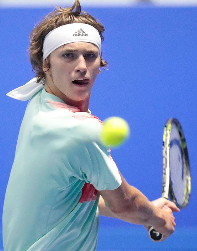 Alexander Zverev of Germany returns the ball to Stan Wawrinka of Switzerland during the St. Petersburg Open ATP tennis tournament final match