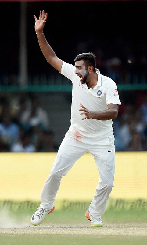 Ravichandran Ashwin celebrates the wicket of New Zealands Tom Latham on the fourth day of the first Test match