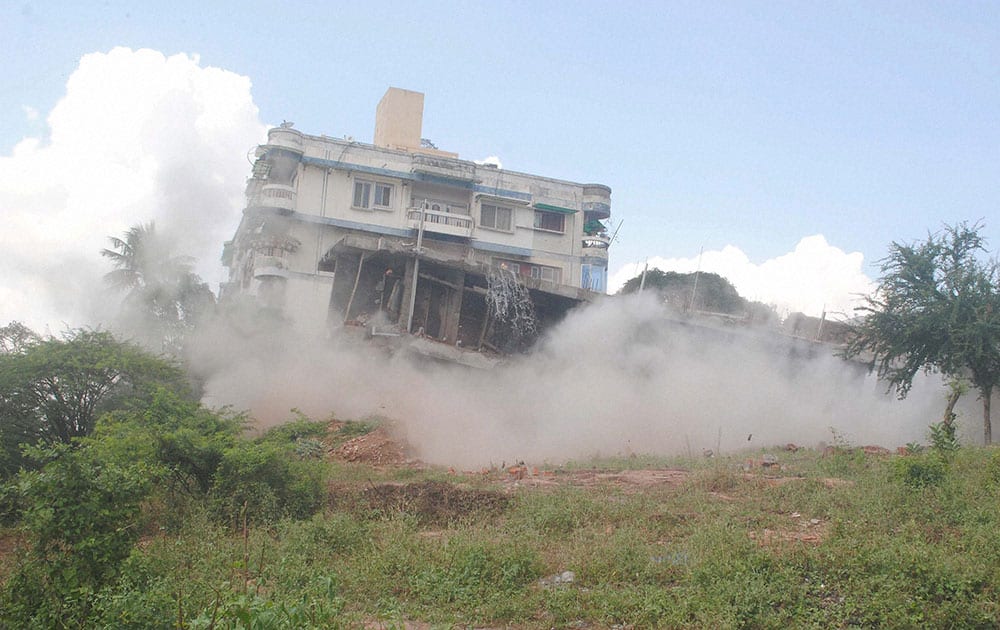 An illegally constructed double-storeyed building is blasted