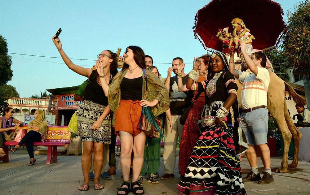 Tourists celebrating World Tourism Day in Pushkar