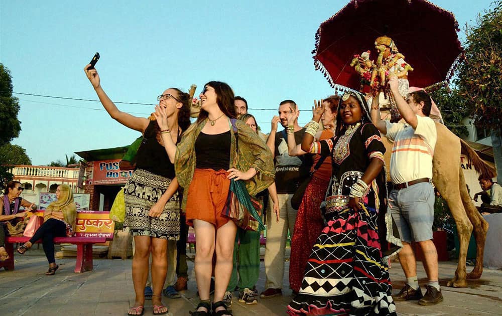 Tourists celebrating World Tourism Day in Pushkar