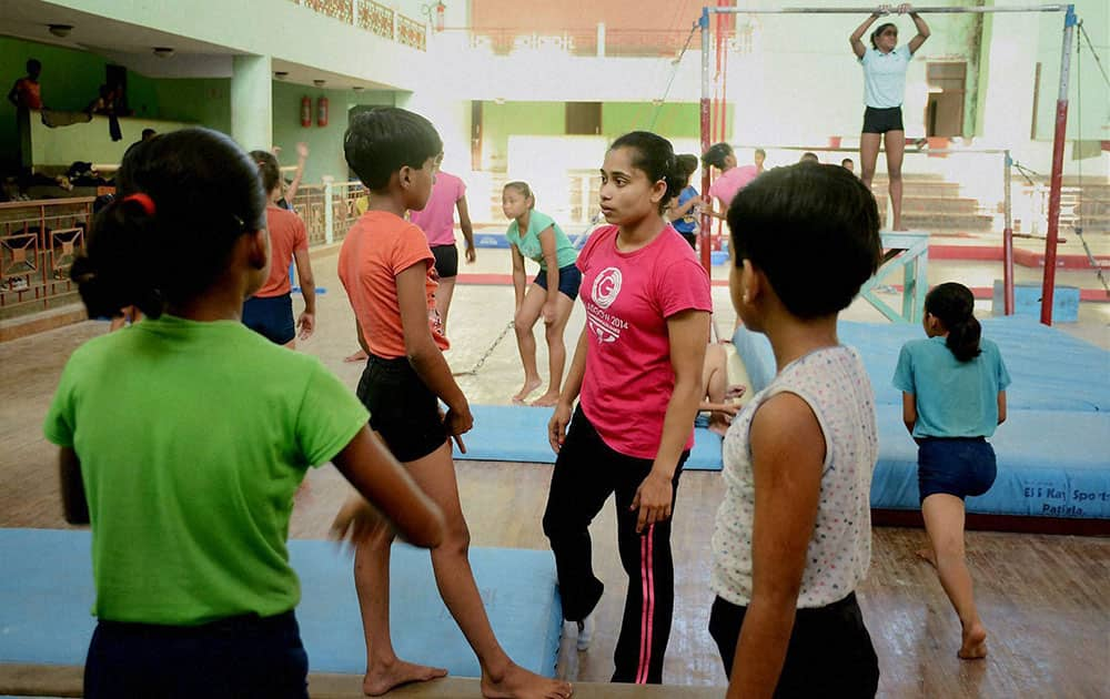 Gymnast Dipa Karmakar giving tips to young gymnasts at a stadium in Agartala, Tripura