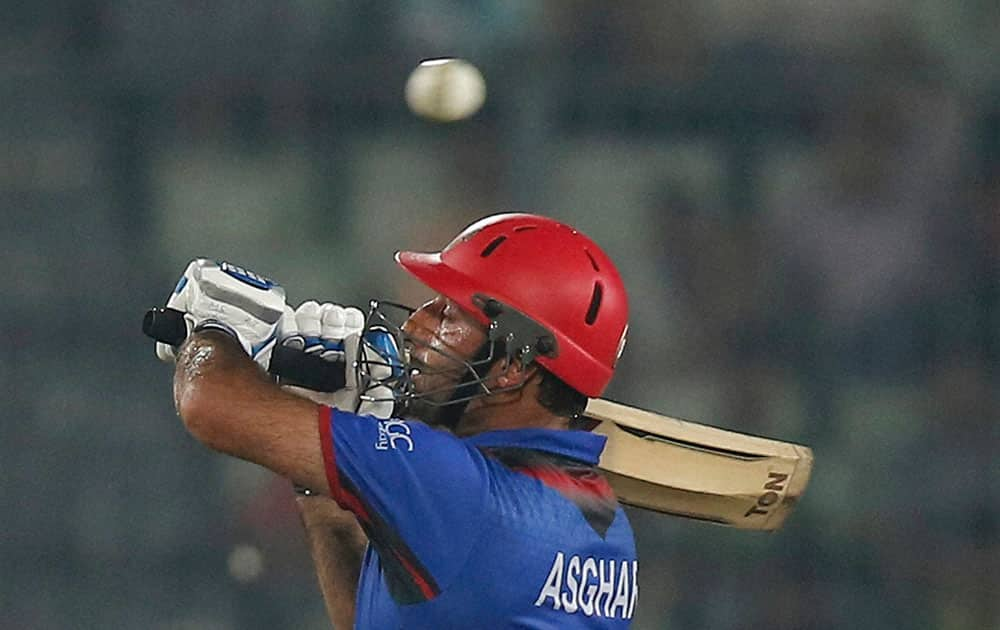 Afghanistans captain Asghar Stanikzai avoids a bouncer during the second one-day international cricket match against Bangladesh in Dhaka