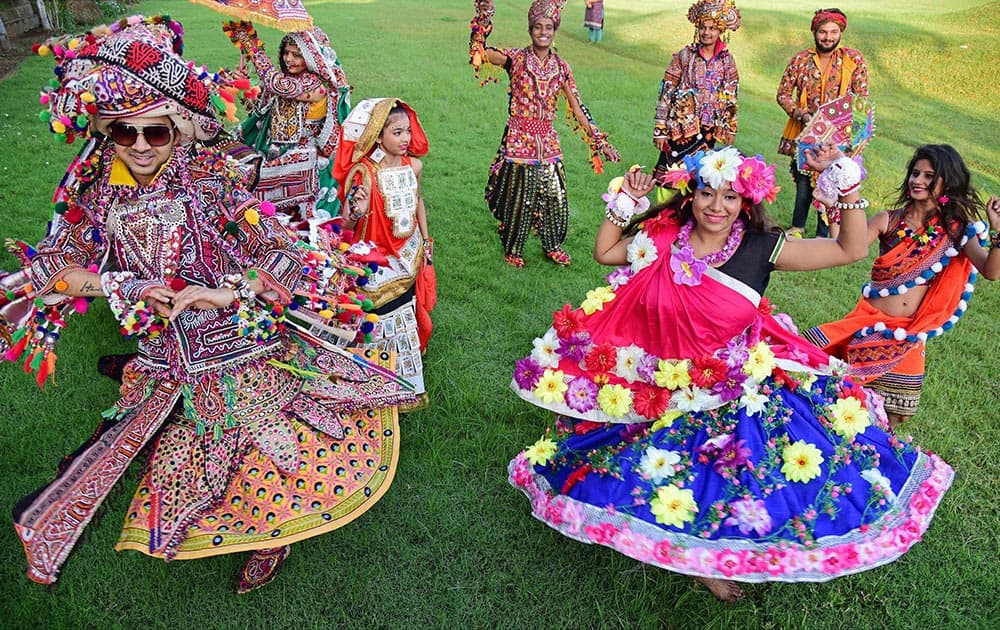 Artists practice the Garba dance