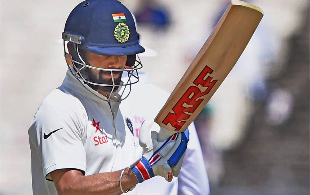 Virat Kohli reacts after being dismissed during 1st day of 2nd Test Match against New Zealand at Eden Garden in Kolkata