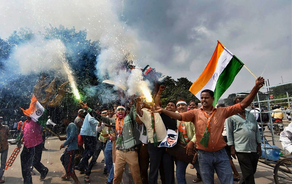 BJP activists celebrate the Indian armys Surgical strikes along the Line of Control in PoK, in Patna