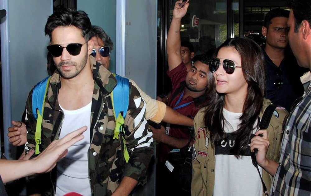 Varun Dhawan and actress Alia Bhatt arrive for the opening ceremony of the 3rd edition of ISL at LGBI Airport in Guwahati