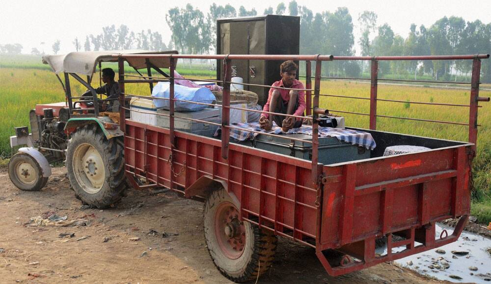 Villagers carrying their luggage