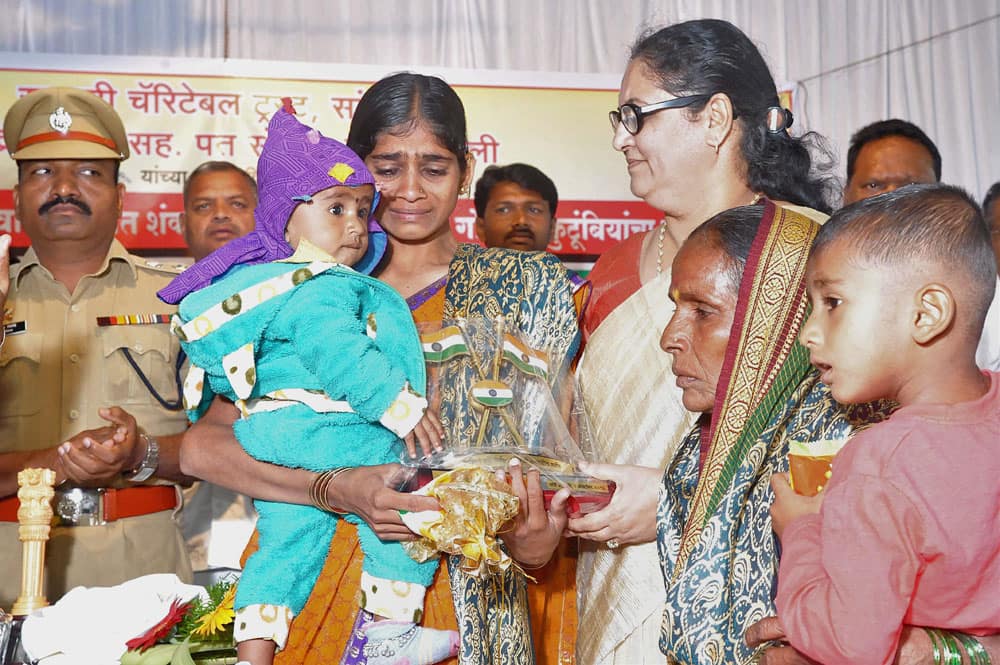 Chandrakant Galande's wife presented cheque