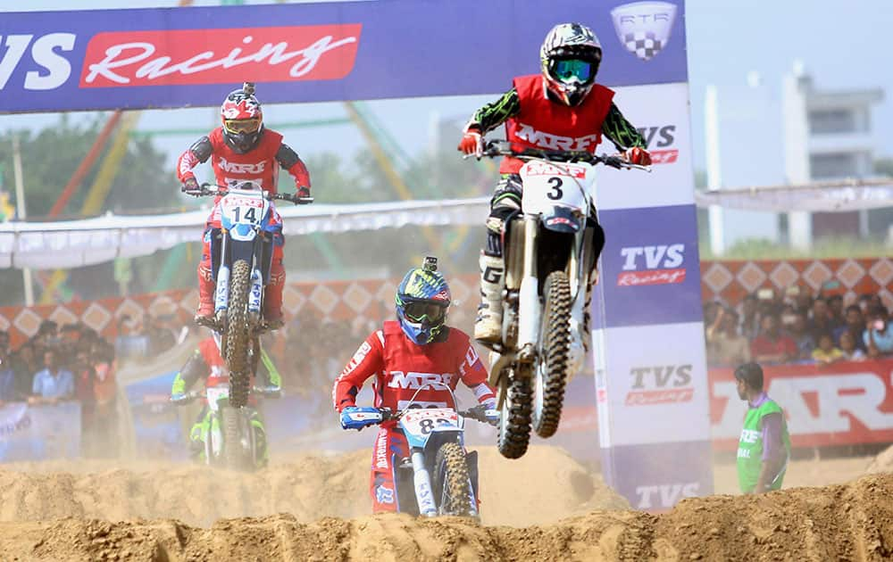 Motorbike riders competing in a motocross race at National Supercross Championship 2016