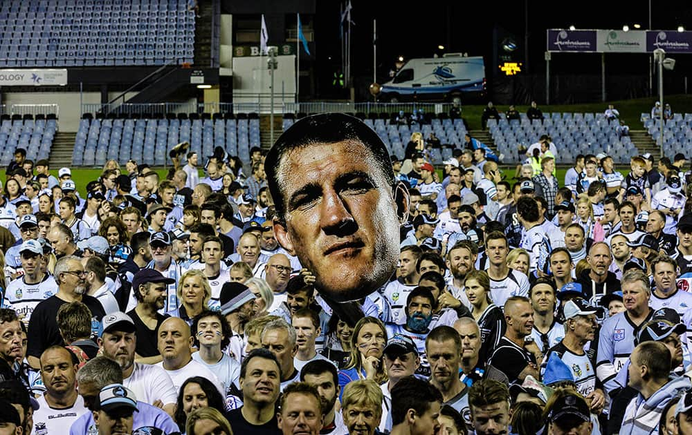 Sharks fans celebrate at Southern Cross Group Stadium after 2016 NRL Grand Final in Sydney