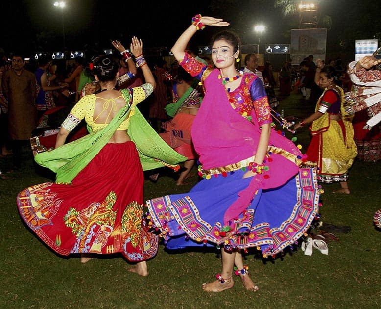 Artists perform Garba