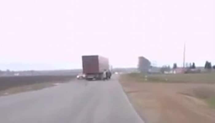 Scary paranormal activity: Lorry driver swerves to avoid &#039;ghost&#039; on road – WATCH this viral video