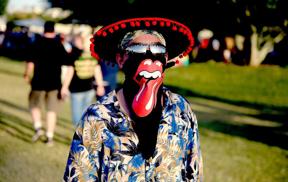 A music fan poses during Desert Trip at the Empire Polo Field in Indio, California A music fan poses during Desert Trip at the Empire Polo Field in Indio, California