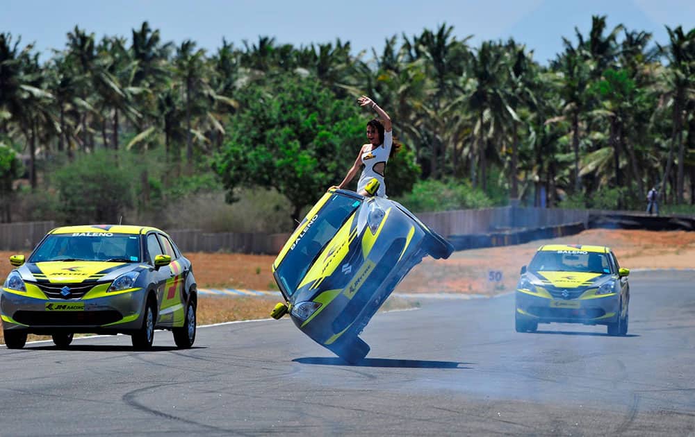 A stunt being performed on the final day of Round 3 of the 19th JK Tyre-FMSCI National Racing Championship in Coimbatore A stunt being performed on the final day of Round 3 of the 19th JK Tyre-FMSCI National Racing Championship in Coimbatore