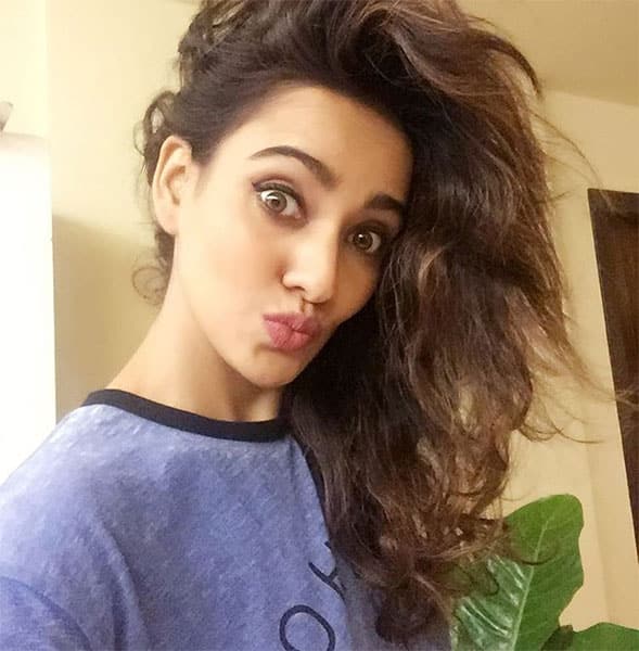 neha sharma :- Got home after a crazy day to crazy hair zzzzz....good night lovelies