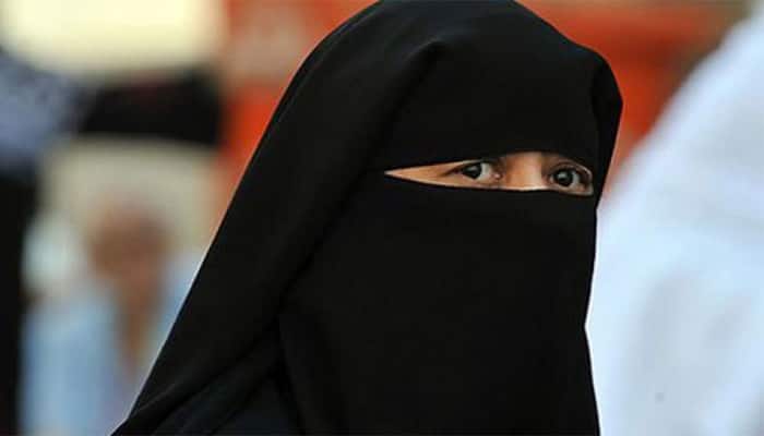 Burqa clad VHP leader caught, beaten for molesting women at religious event
