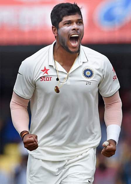 Umesh Yadav celebrates the wicket