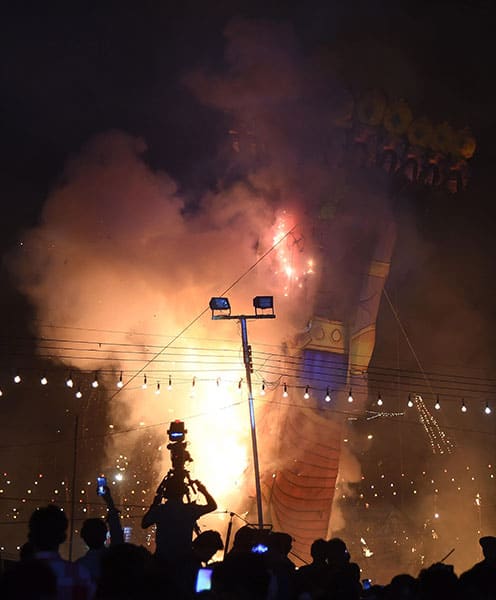 An effigy of demon King Ravana is burnt on Dussera in New Delhi