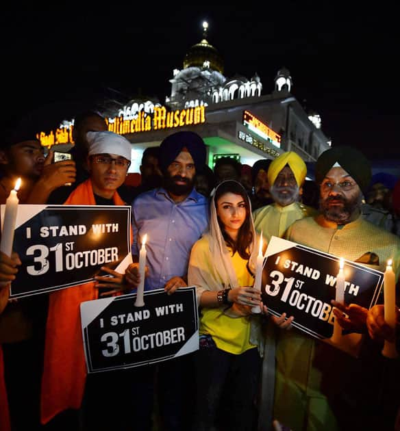 Actress Soha Ali Khan leads the candlelight march