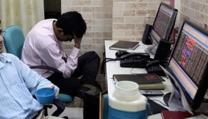 Sensex, Nifty plunge on lower guidance, US rate hike fears