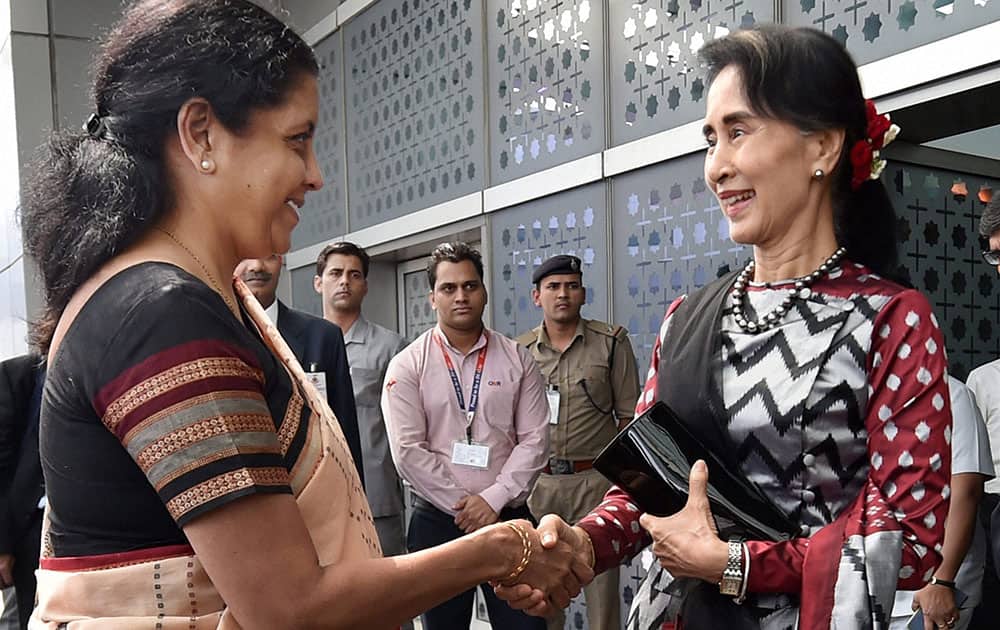 Myanmars Foreign Minister, Aung San Suu Kyi being received by MoS for Commerce & Industries Nirmala Sitaraman on her arrival at IGI airport T3 in New Delhi